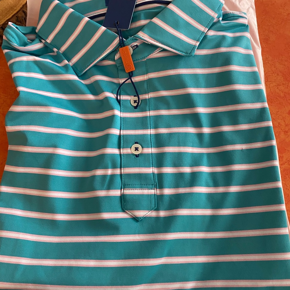 Golf Polo from Stitch. Brand new in packaging. Teal with pink stripes